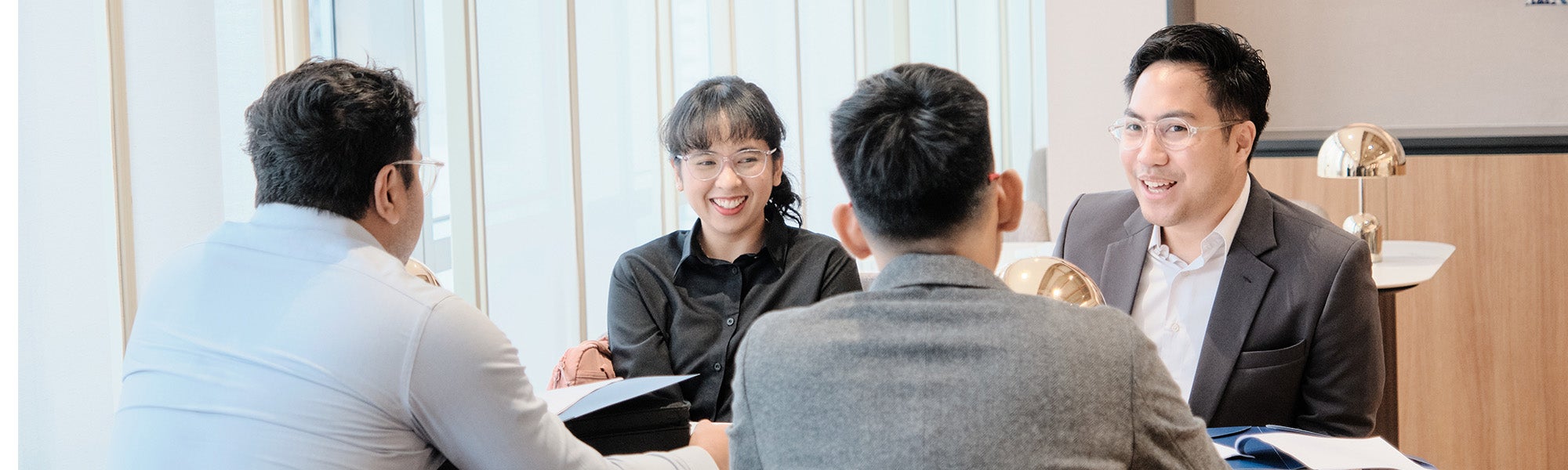 Students talking in a study room
